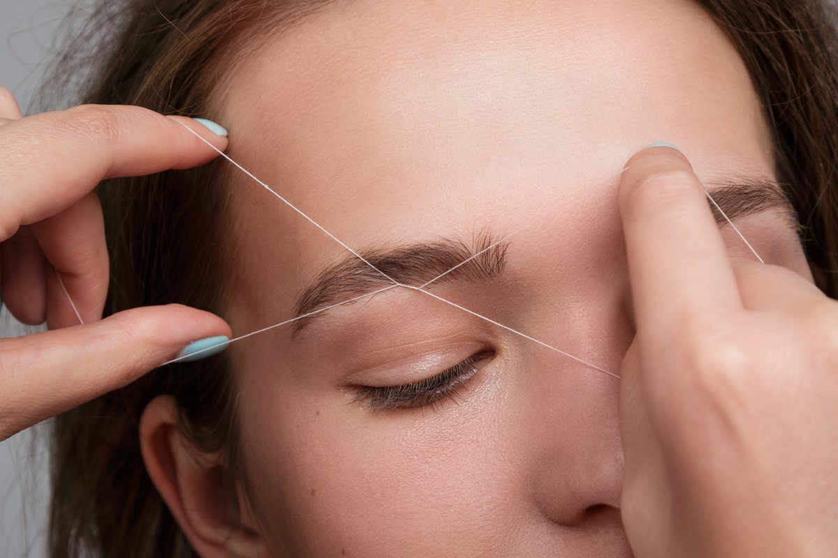 Eyebrow threading close up