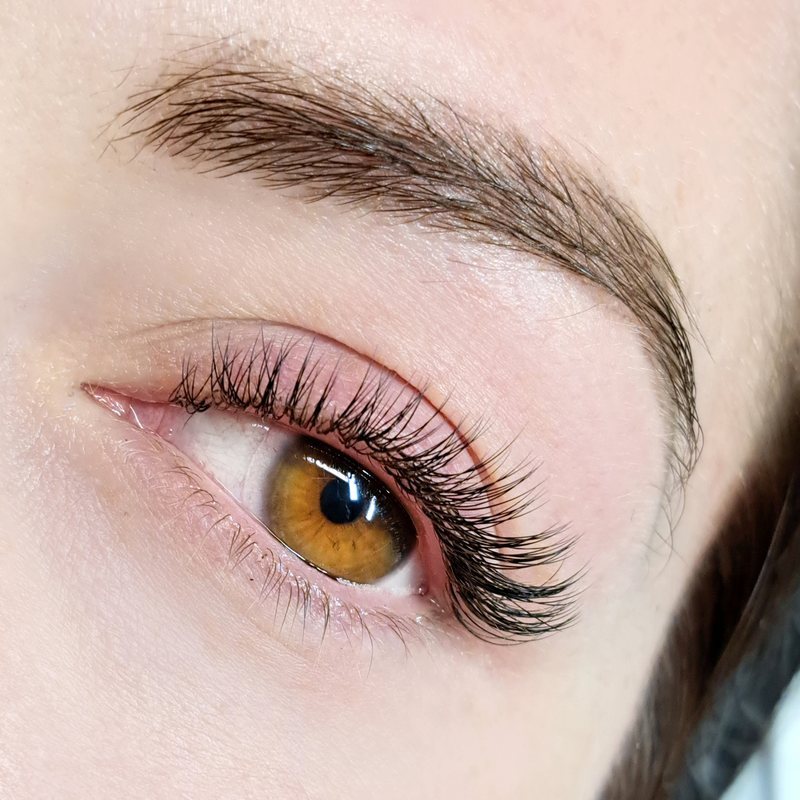 Style example of classic eyelash extensions, one extension on each natural lash